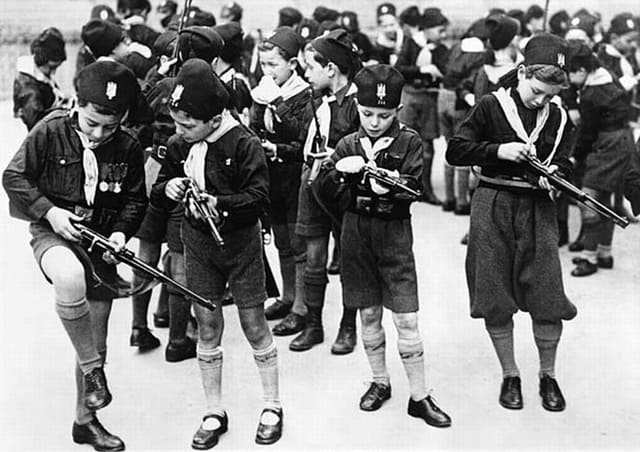 Children trained to be militants at the Italian Ballila fascist organization